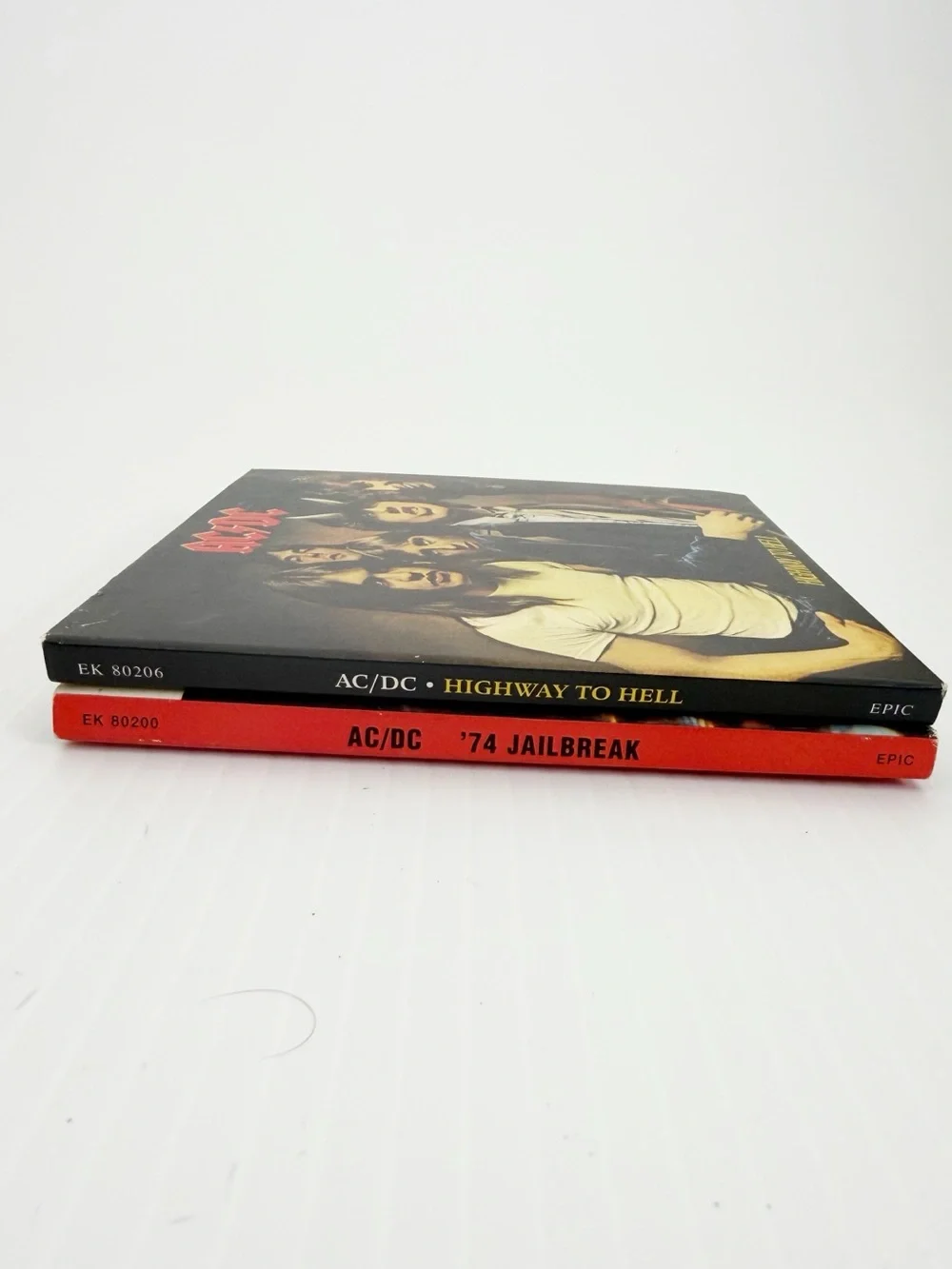 Set of 2 2003 AC/DC Remastered Music CDs Epic Jailbreak Highway to Hell